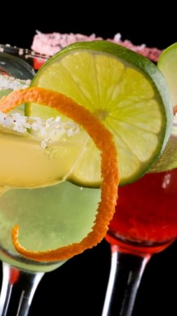 cocktails, fruit, orange, apple, lime, strawberries, ice, sugar (vertical)