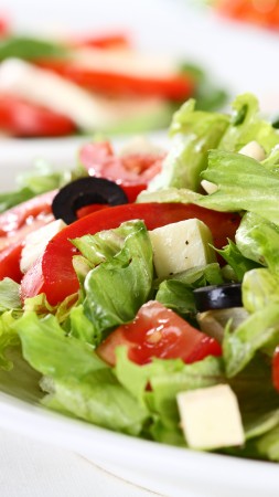 Greek, cooking, recipe, lettuce, tomatoes, cucumbers, olives, feta (vertical)